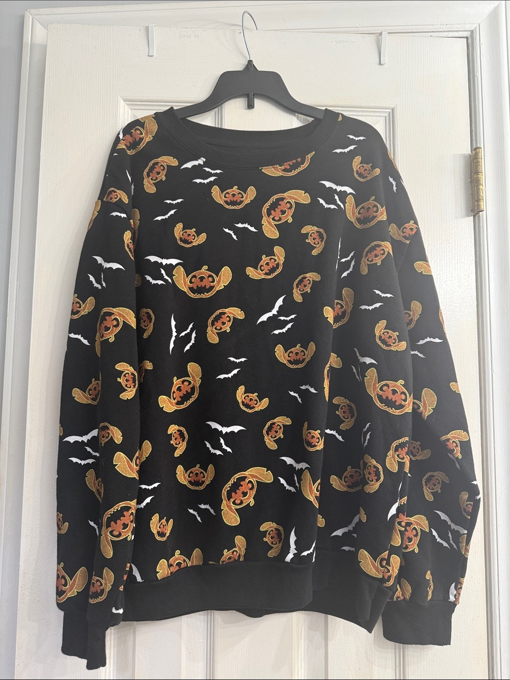 Disney Black Crewneck juniors Sweatshirt with Orange Pumpkin & White Bat Print